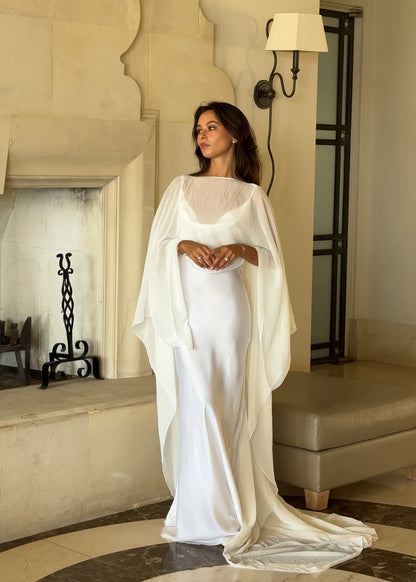 women wearing bridal cape