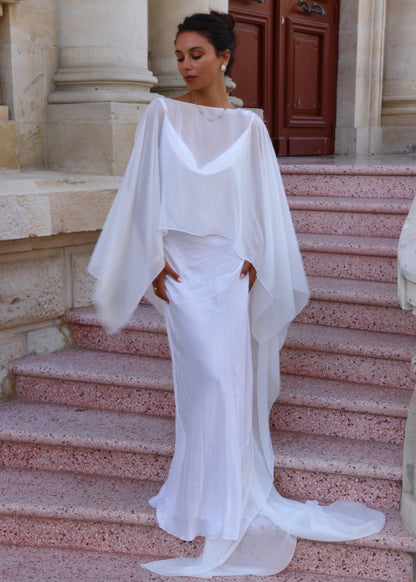 women wearing white bridal cape front